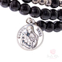 Bracciale a spirale in ematite con perle e medaglia di Santa Rita