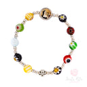 Bracciale Santa Rita elastico grani in vetro colorato