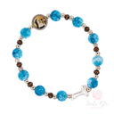 Bracciale Santa Rita Elastico Grani Vetro Celeste e Tau