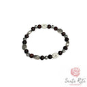 Bracciale elastico con grani in legno e roselline