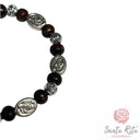 Bracciale elastico con grani in legno e roselline