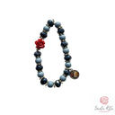 Bracciale Elastico Santa Rita con Grani in Pietra Grigia,Rosa in Pasta di Corallo e Medaglia 🌹