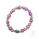 Bracciale elastico con grani perla e vetro