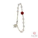 Bracciale Santa Rita Grani in Mezzo Cristallo Bianco, Rosa in Pasta di Corallo e Medaglia
