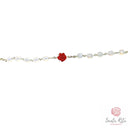 Bracciale Santa Rita Grani in Mezzo Cristallo Bianco, Rosa in Pasta di Corallo e Medaglia