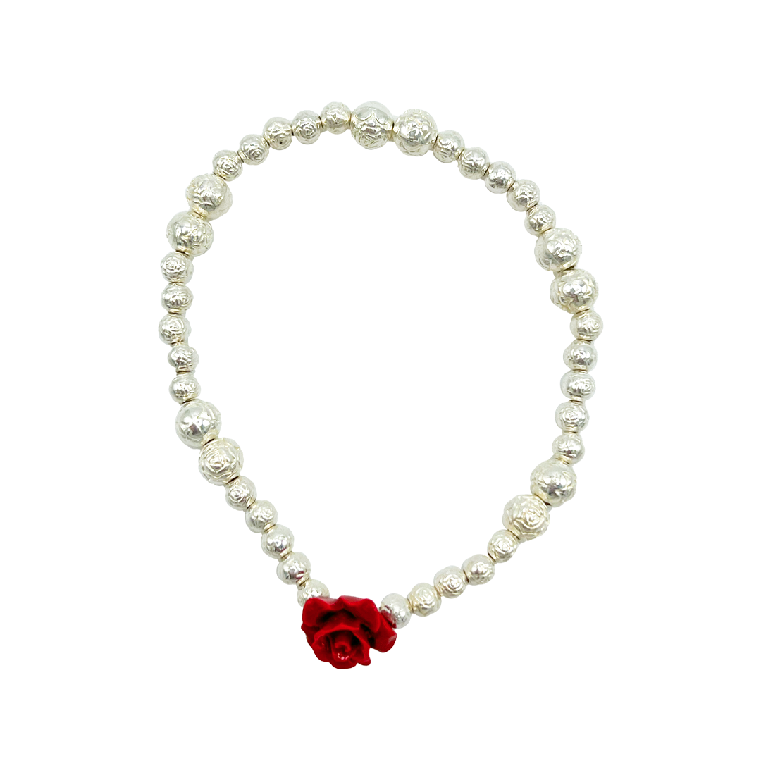 Bracciale elastico con rosa in pasta di corallo