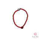Bracciale Elastico Santa Rita con Grani in Mezzo Cristallo Sfaccettato, Rosa in Pasta di Corallo e Medaglia 🌹