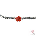 Bracciale Elastico Santa Rita con Grani in Mezzo Cristallo Sfaccettato, Rosa in Pasta di Corallo e Medaglia 🌹