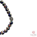 Bracciale Elastico Santa Rita con Grani Blu a Fiori e Medaglia Due Facce Santa Rita e Rosa 🌹