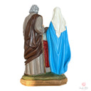 Vista posteriore della statua della Sacra Famiglia Santa Rita Souvenirs in resina dipinta a mano con dettagli vivaci
