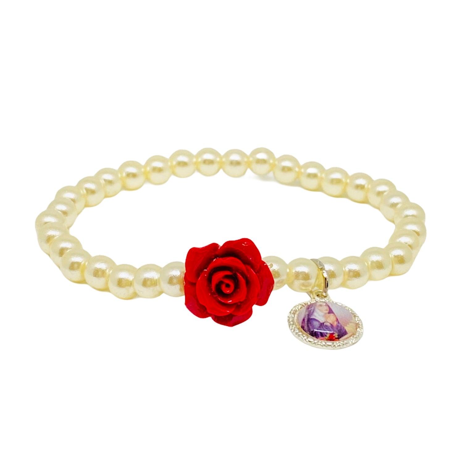 Bracciale elastico con grani in perla e con Rosa